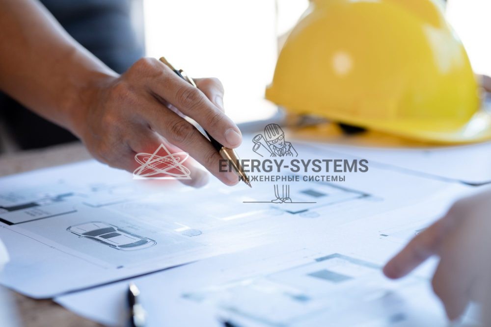 инженеры обсуждают проектную документацию
