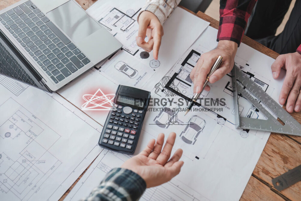 трое человек обсуждают проект лежащий на столе