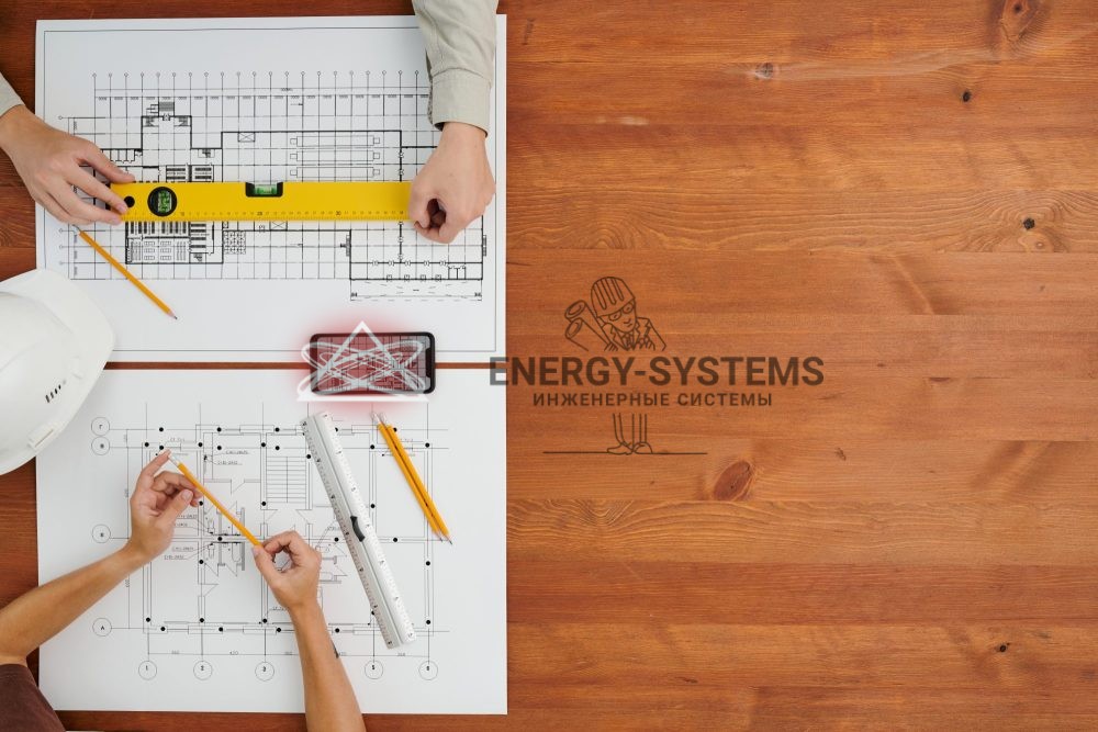 два чертежа на столе обсуждение проекта