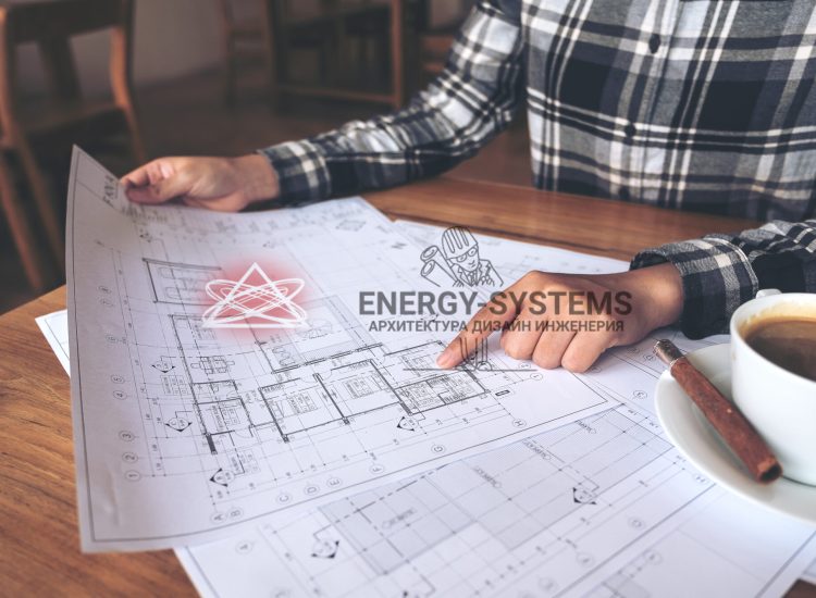 инженер работает над проектом рядом с кружкой кофе