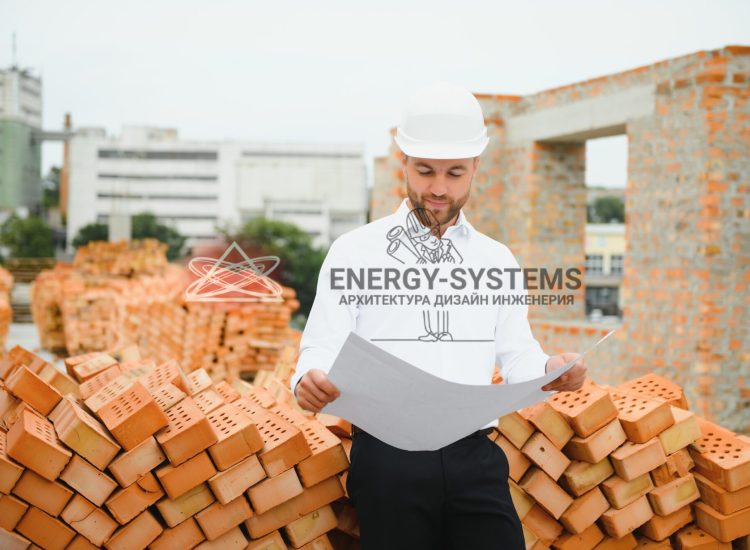 мужчина на фоне кирпичей смотрит в проект