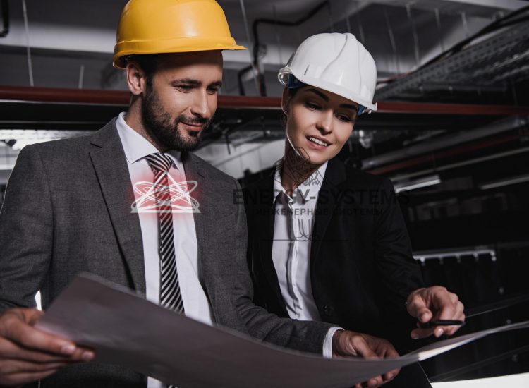 Инженеры обсуждают проект современных инженерных систем