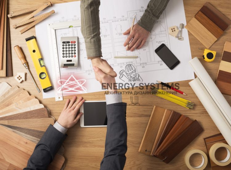 архитектор и заказчик пожимают друг другу руки над проектом